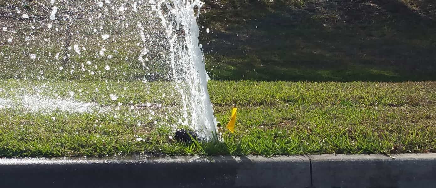 Sprinkler system watering a lawn bed in Orlando FL